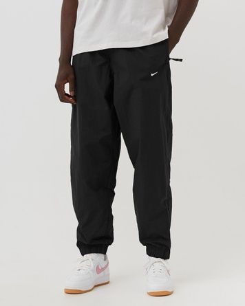 Спортивні штани Nike Solo Swoosh Trackpant Чорний XL DQ6571-010 DQ6571-010 фото