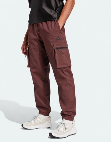Флісові штани adidas City Escape Premium Бордовий M JF3285 JF3285 фото